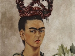 Self portrait with Cropped Hair by Frida Kahlo